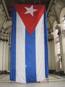 Cuban flag in one of the large halls where the ceiling is being restored.