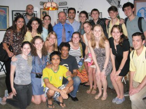The whole class met with Yaoni (next to Bill), her husband and son in their living room for a couple of hours.