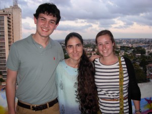 Thomas and Emily with Yoani Sanchez on the balcony of her apartment.