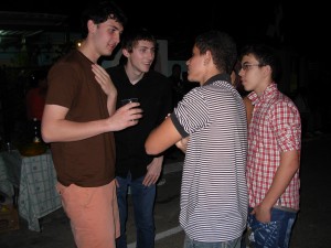 Thomas & Kyle talking with youth at the neighborhood CDR gathering.