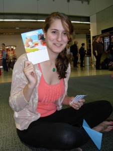 We celebrated Maddy's weekend birthday (a day early) with a cookie and candle in the Atlanta Airport.