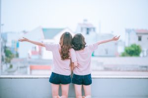 two kids hugging