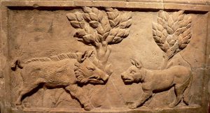 A roman relief of a wild boar and a hunting dog (c. 200-300 CE)